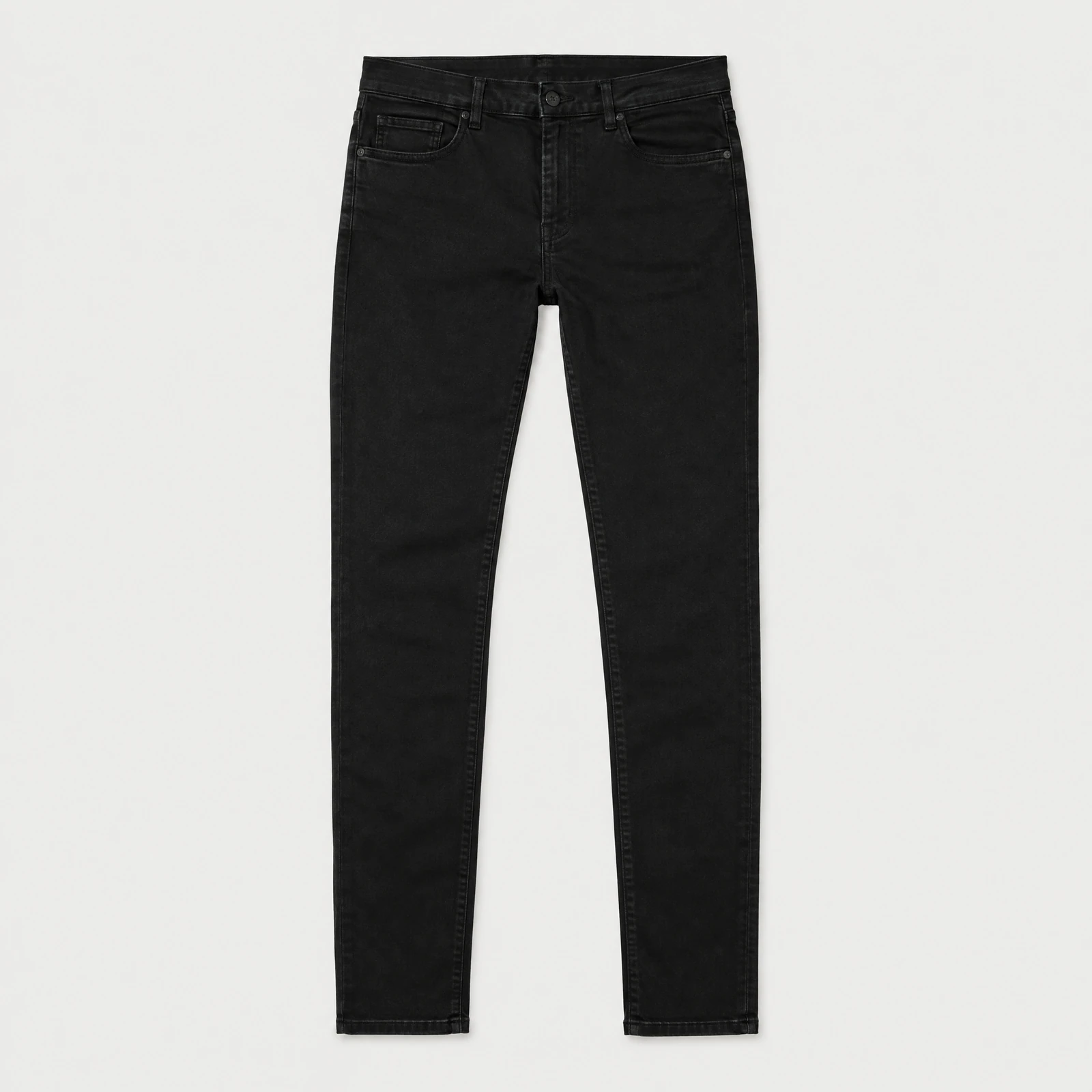 Black slim-cut five-pocket jeans laid flat on a light gray background